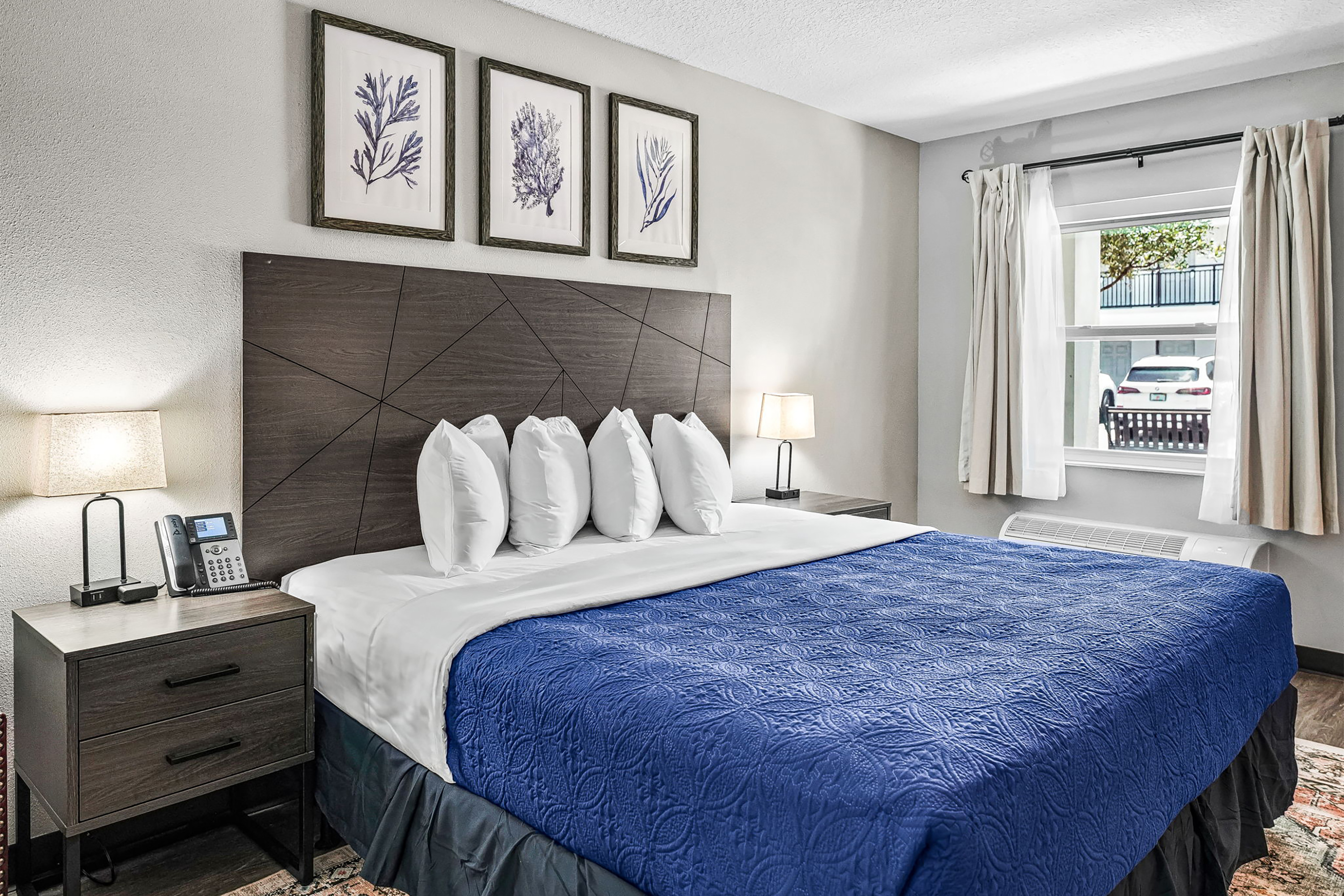 Guest room at the Baymont by Wyndham Ocala Suites in Ocala, Florida